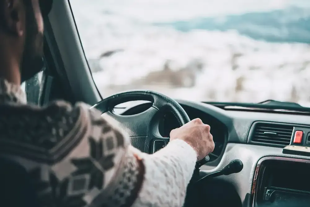 Man driving a car